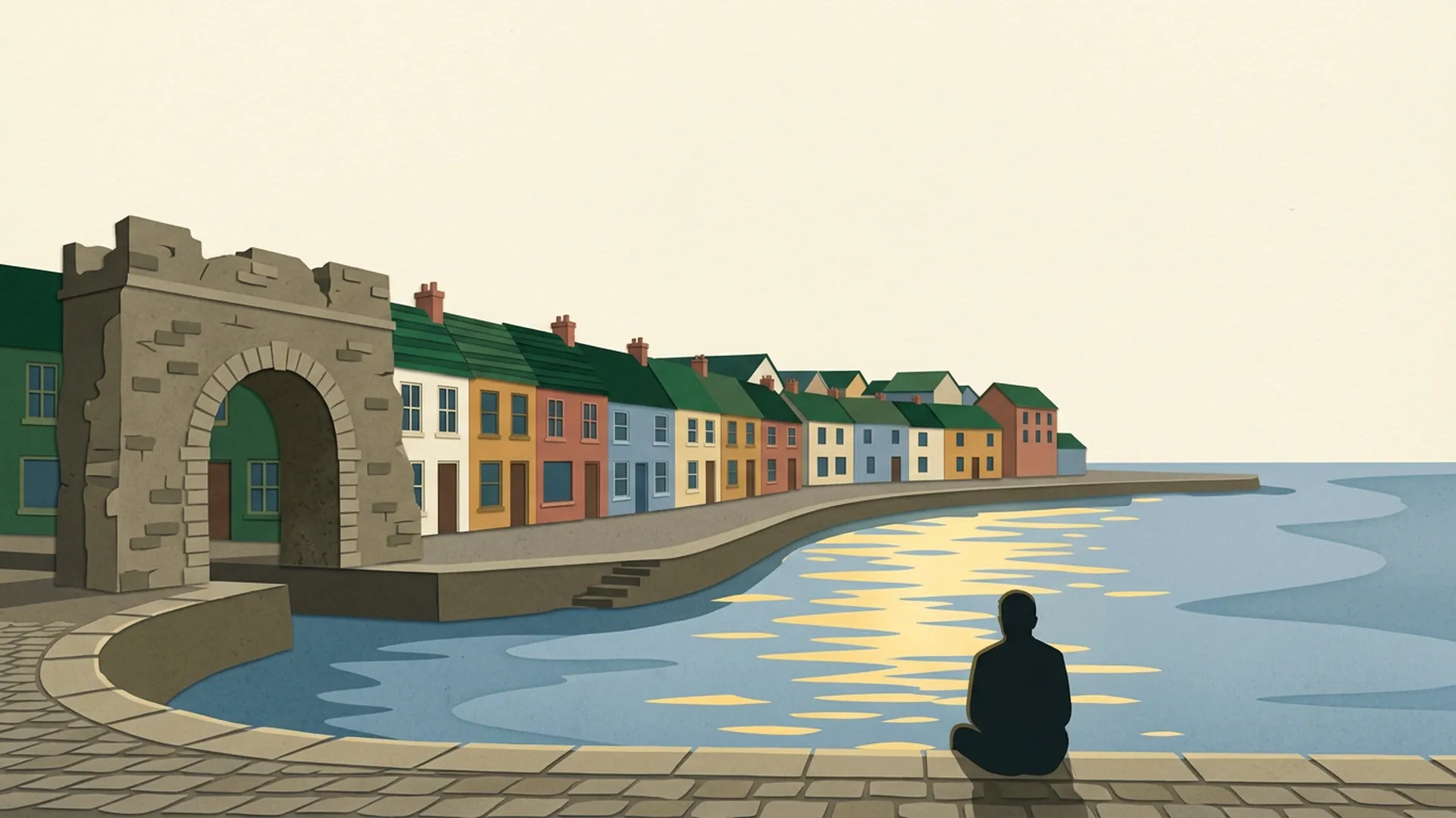 Daniel sits alone beside the water at the sunny Galway docks, with the Spanish Arch and colourful houses.